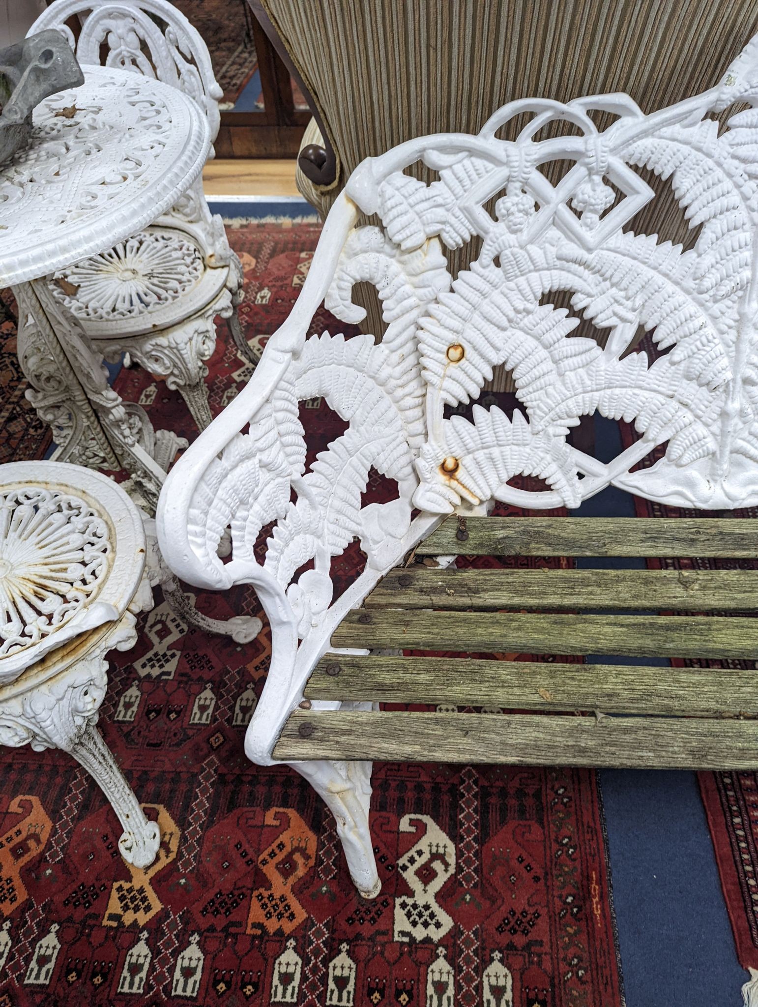 A Victorian Coalbrookdale design painted cast iron fern pattern garden bench, length 114cm, depth 44cm, height 90cm
